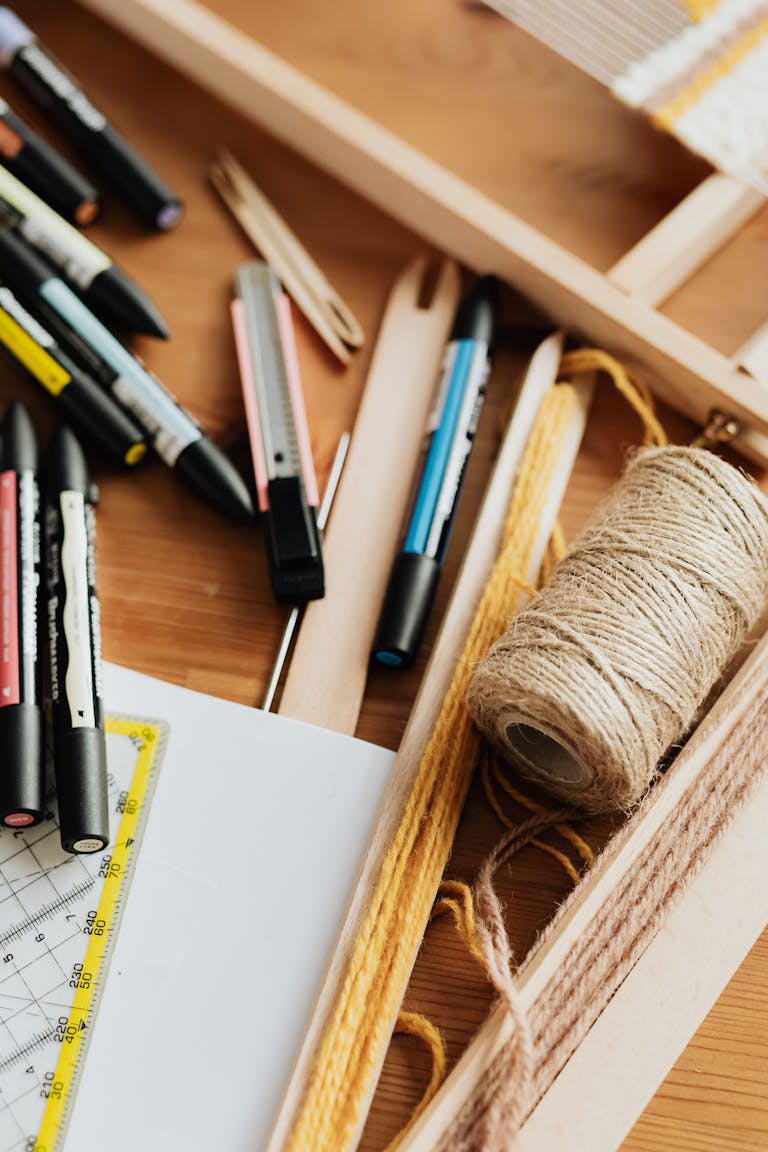 Organized assortment of art supplies for creative projects.