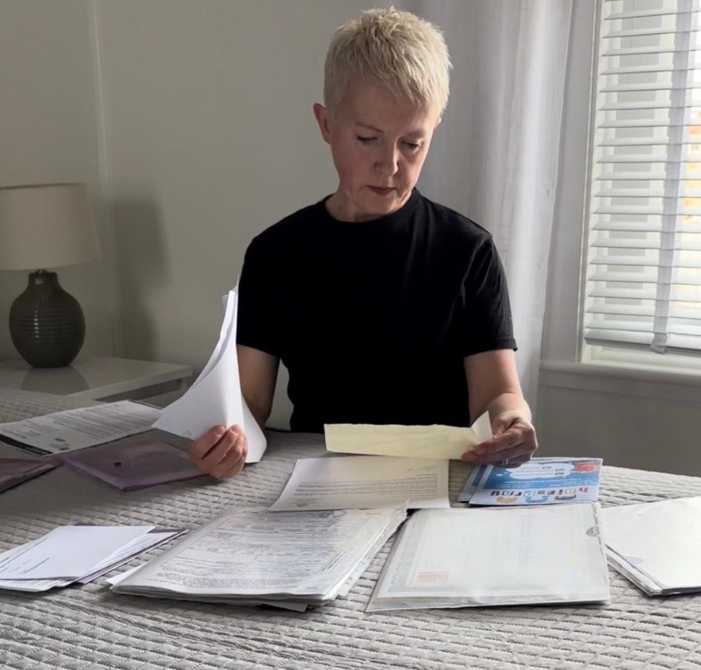 Organising paperwork at home by sorting documents into categories
