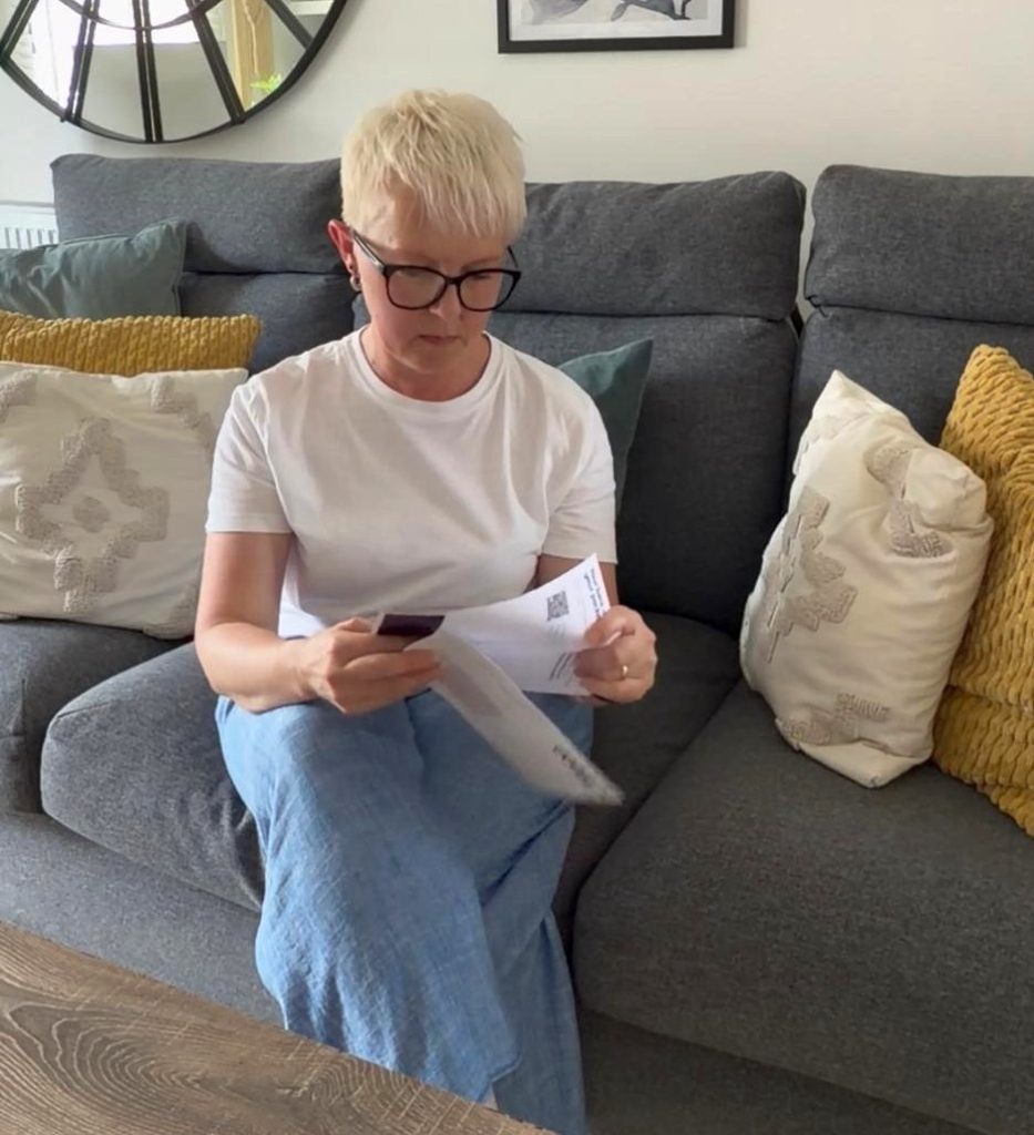 Reading a letter and deciding what to do with incoming paperwork